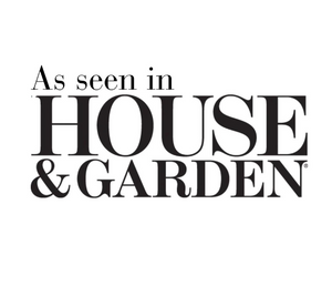 Text 'As seen in HOUSE & GARDEN' on a white background