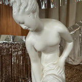 The Figurine Une